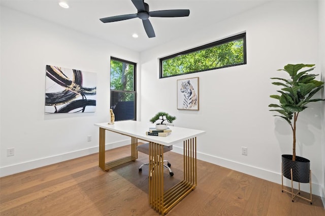 office featuring baseboards, recessed lighting, a ceiling fan, and wood finished floors