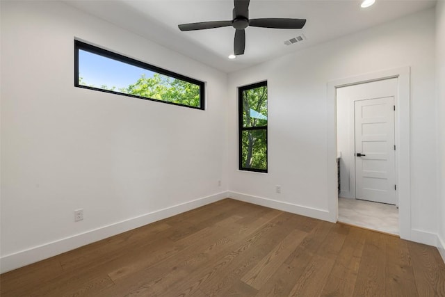 3705 Wilson St Unit 1, Austin, TX 78704 - empty room with wood finished floors, recessed lighting, and ceiling fan