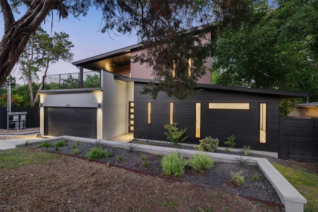 3705 Wilson St Unit 1, Austin, TX 78704 - contemporary house featuring a balcony, a garage, and driveway