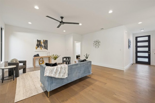 3705 Wilson St Unit 1, Austin, TX 78704 - living area featuring a ceiling fan, wood finished floors, and recessed lighting