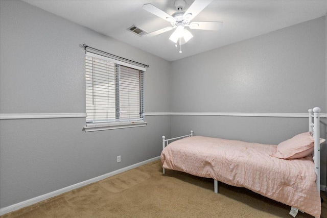 110 Hummingbird Ct, Cedar Creek, TX 78612 - carpeted bedroom featuring baseboards and ceiling fan