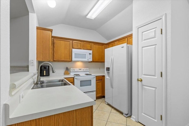 110 Hummingbird Ct, Cedar Creek, TX 78612 - kitchen with white appliances, a sink, vaulted ceiling, brown cabinetry, and light countertops
