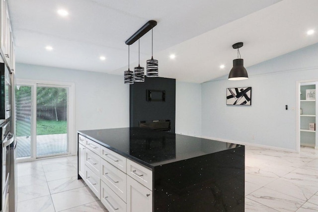 309 Northwood Dr, Georgetown, TX 78628 - kitchen featuring light marble finish flooring, white cabinets, vaulted ceiling, dark stone counters, and recessed lighting