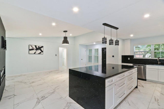 309 Northwood Dr, Georgetown, TX 78628 - kitchen with stainless steel dishwasher, light marble finish flooring, recessed lighting, white cabinetry, and decorative light fixtures