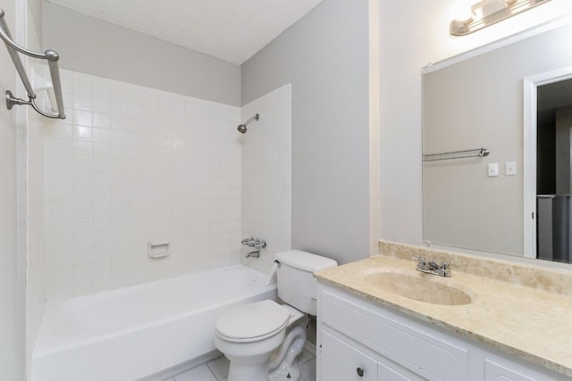 7301 Scenic Brook Dr, Austin, TX 78736 - full bath with toilet, a textured ceiling, vanity, shower / tub combination, and tile patterned floors