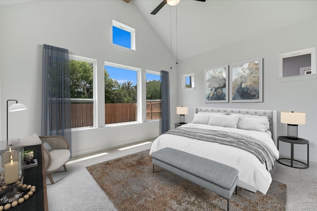 1352 S Brook Dr, Leander, TX 78641 - bedroom with carpet, multiple windows, high vaulted ceiling, and ceiling fan