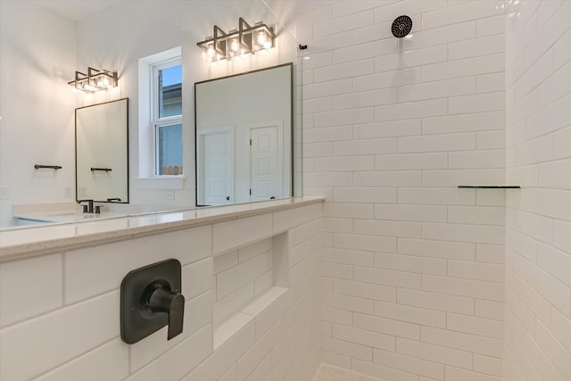 1352 S Brook Dr, Leander, TX 78641 - bathroom featuring a tile shower and vanity