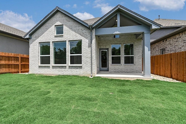 1352 S Brook Dr, Leander, TX 78641 - back of house with a patio area and brick siding