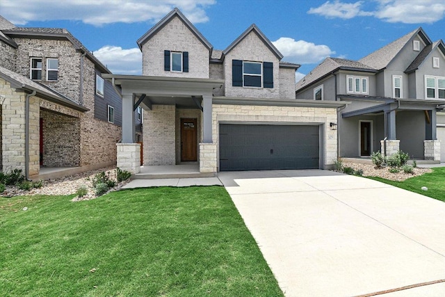 1352 S Brook Dr, Leander, TX 78641 - view of front of property with a front lawn, driveway, an attached garage, brick siding, and covered porch