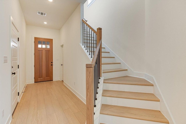 1352 S Brook Dr, Leander, TX 78641 - entryway with stairway, light wood-style flooring, recessed lighting, and baseboards