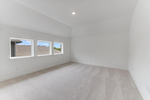 1352 S Brook Dr, Leander, TX 78641 - empty room featuring light colored carpet, lofted ceiling, baseboards, and recessed lighting