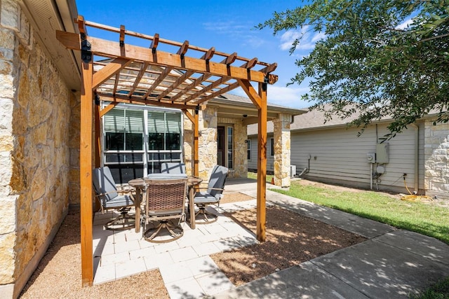 604 Comal Run, Hutto, TX 78634 - view of patio with a pergola and outdoor dining space