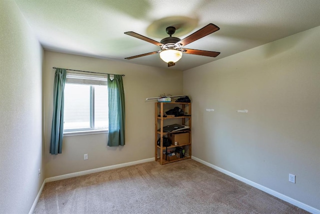604 Comal Run, Hutto, TX 78634 - carpeted empty room with ceiling fan and baseboards