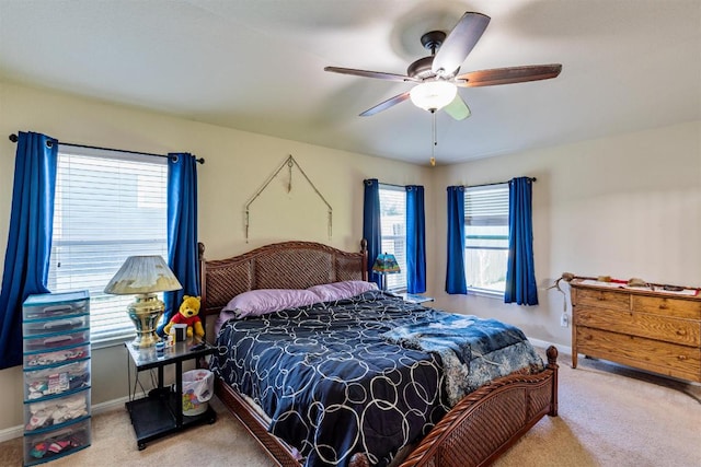 604 Comal Run, Hutto, TX 78634 - bedroom with carpet floors and a ceiling fan