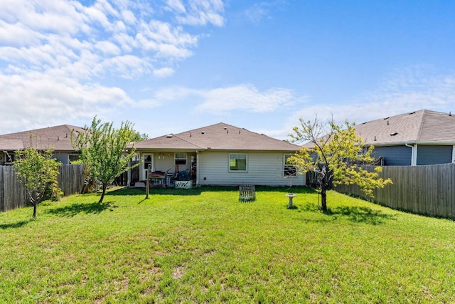604 Comal Run, Hutto, TX 78634 - rear view of property featuring a fenced backyard