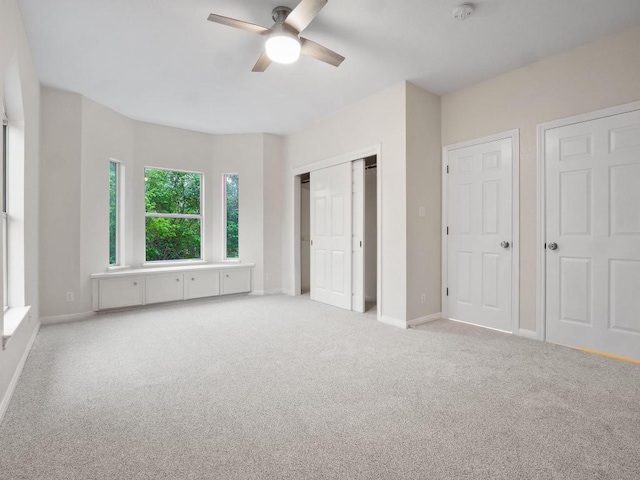 9402 Bluegrass Dr, Austin, TX 78759 - unfurnished bedroom with carpet flooring and ceiling fan