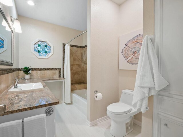 9402 Bluegrass Dr, Austin, TX 78759 - full bath with shower / tub combo with curtain, vanity, and tile patterned floors