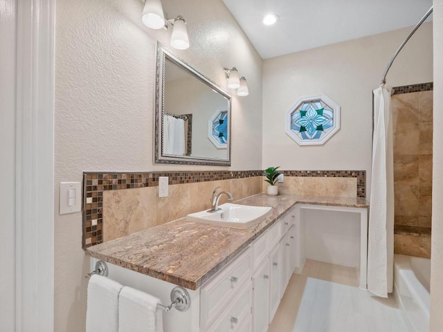 9402 Bluegrass Dr, Austin, TX 78759 - full bathroom with vanity, tile patterned flooring, decorative backsplash, and shower / bath combination with curtain