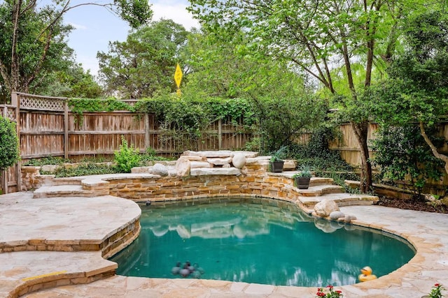9402 Bluegrass Dr, Austin, TX 78759 - view of swimming pool featuring a fenced backyard and a patio area
