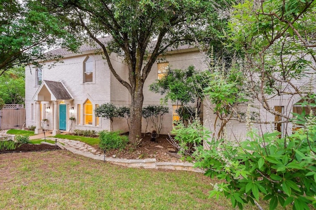 9402 Bluegrass Dr, Austin, TX 78759 - view of front of home with brick siding