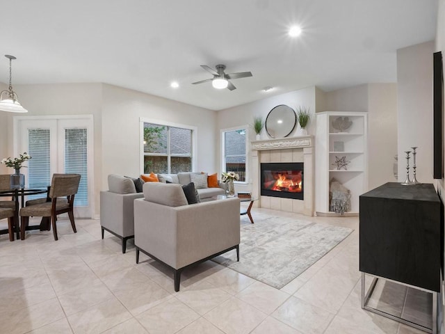 9402 Bluegrass Dr, Austin, TX 78759 - living area featuring ceiling fan, a tile fireplace, recessed lighting, and light tile patterned flooring