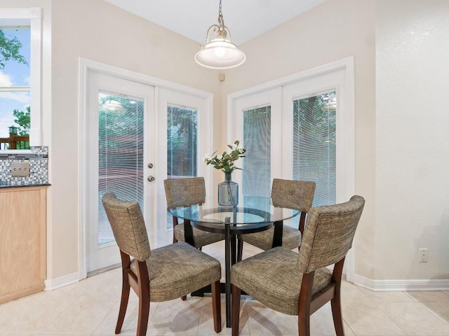 9402 Bluegrass Dr, Austin, TX 78759 - dining room featuring french doors and light tile patterned floors