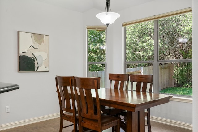 630 Wild Rose Dr, Austin, TX 78737 - tiled dining area featuring baseboards