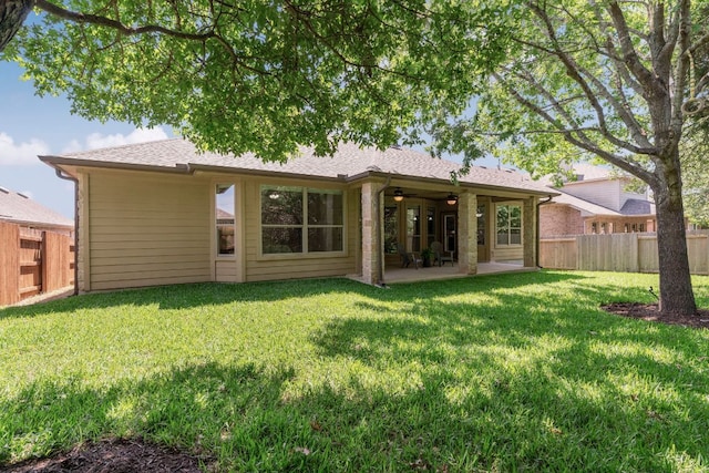 630 Wild Rose Dr, Austin, TX 78737 - rear view of house with a ceiling fan, a fenced backyard, and a patio area
