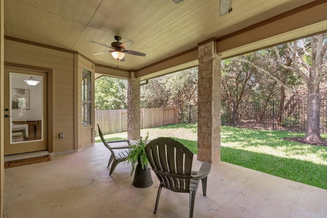 630 Wild Rose Dr, Austin, TX 78737 - fenced backyard featuring a ceiling fan and a patio area