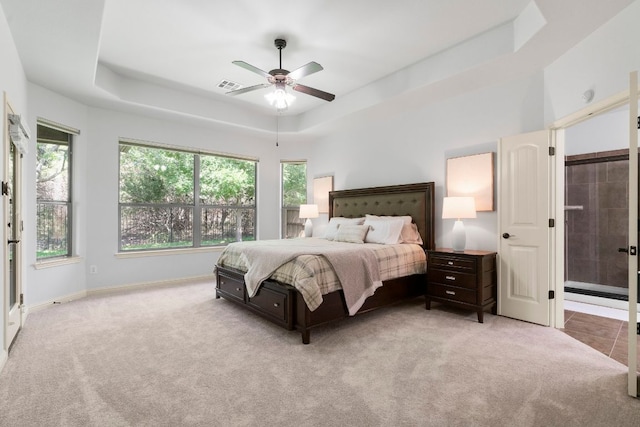630 Wild Rose Dr, Austin, TX 78737 - bedroom with a raised ceiling, light colored carpet, and ceiling fan