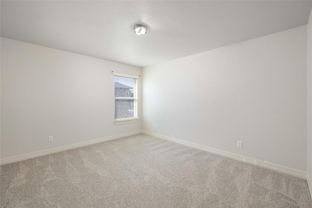 680 Peacock Ln, New Braunfels, TX 78130 - carpeted empty room with baseboards