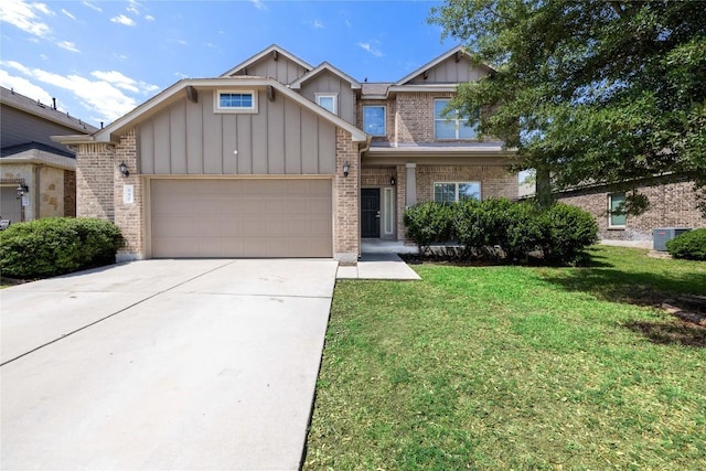 680 Peacock Ln, New Braunfels, TX 78130 - view of front facade with board and batten siding, brick siding, a garage, and a front lawn