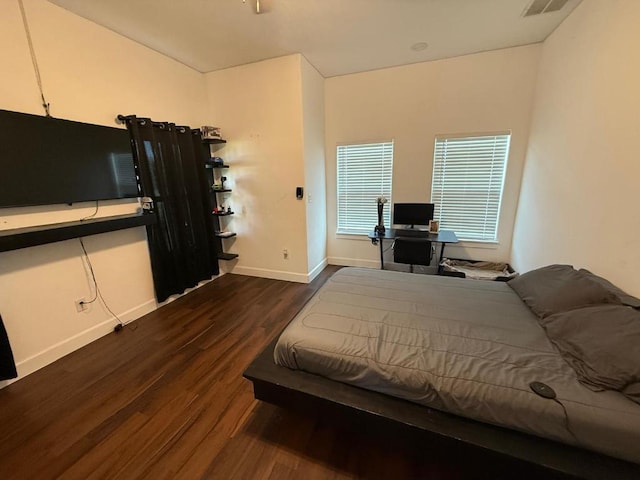 497 Brown Rd, Mcdade, TX 78650 - bedroom with dark wood finished floors and baseboards