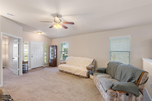 204 Mossberg Ln, Bastrop, TX 78602 - living room with a ceiling fan, carpet flooring, lofted ceiling, and baseboards