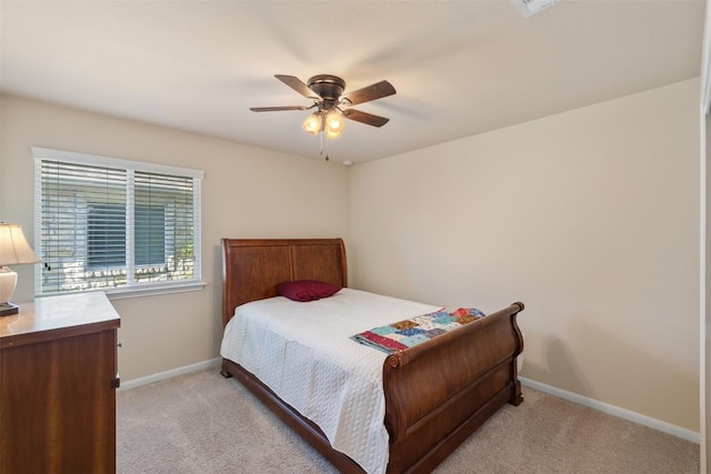 204 Mossberg Ln, Bastrop, TX 78602 - bedroom featuring light colored carpet, baseboards, and ceiling fan