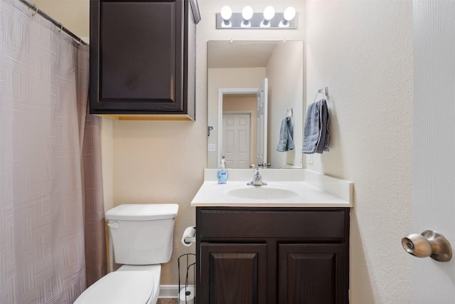 204 Mossberg Ln, Bastrop, TX 78602 - bathroom with toilet, vanity, and a shower with shower curtain