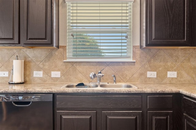 204 Mossberg Ln, Bastrop, TX 78602 - kitchen featuring dishwasher, a sink, dark brown cabinets, and light countertops