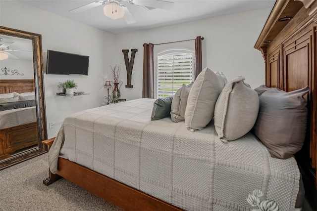 bedroom with carpet floors and a ceiling fan