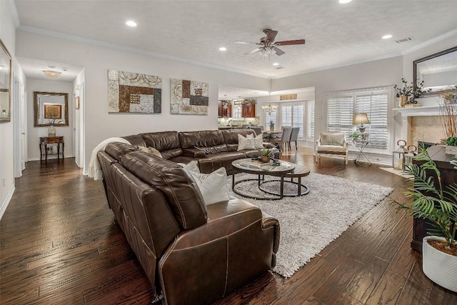 living area featuring ceiling fan, hardwood / wood-style floors, recessed lighting, baseboards, and ornamental molding