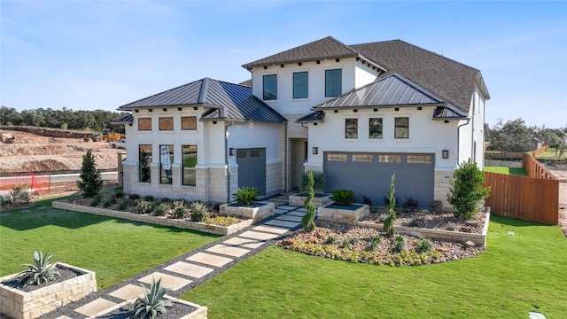 1300 Shelby Ln, Georgetown, TX 78628 - view of front of property with a standing seam roof, an attached garage, metal roof, and stucco siding