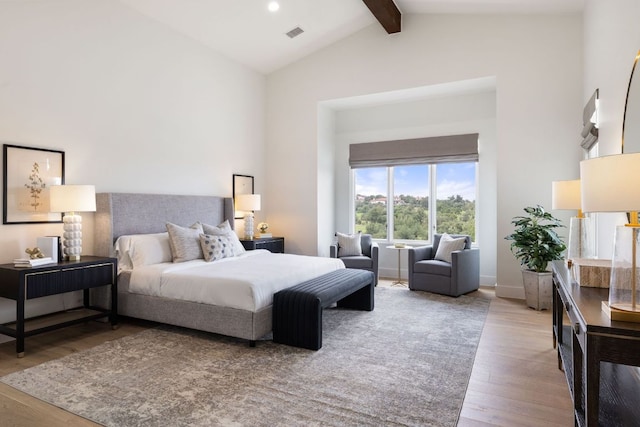 12625 Maidenhair Ln Unit 31, Austin, TX 78738 - bedroom with wood finished floors, beam ceiling, and high vaulted ceiling