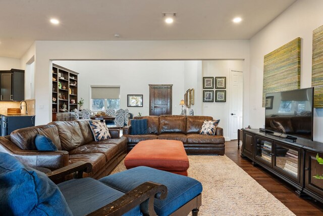 124 Hoskins Trl, Boerne, TX 78006 - living area with dark wood finished floors and recessed lighting