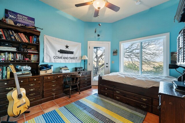 124 Hoskins Trl, Boerne, TX 78006 - tiled bedroom featuring access to outside, a desk, and a ceiling fan