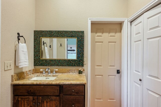 124 Hoskins Trl, Boerne, TX 78006 - bathroom featuring vanity and a textured wall