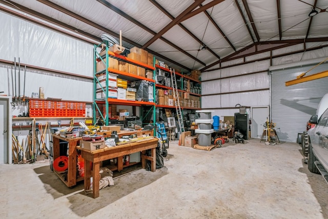 124 Hoskins Trl, Boerne, TX 78006 - garage featuring a workshop area and metal wall