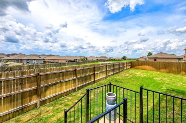 view of yard with a residential view