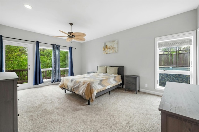 5801 Cannonade Ct, Austin, TX 78746 - carpeted bedroom with access to exterior, a ceiling fan, and recessed lighting