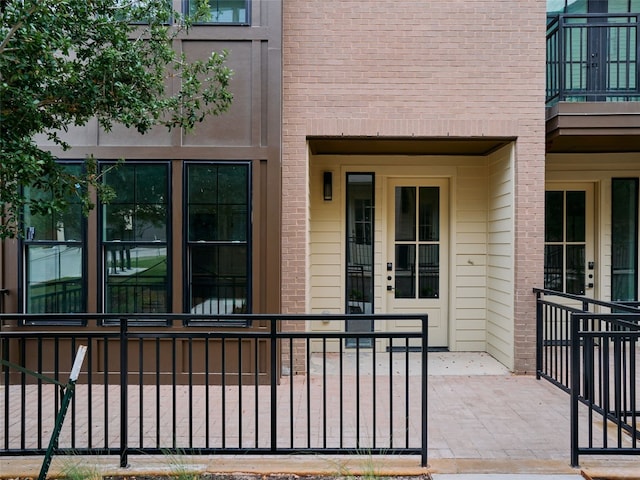 2209 Woodland Ave Unit 501, Austin, TX 78741 - doorway to property featuring brick siding