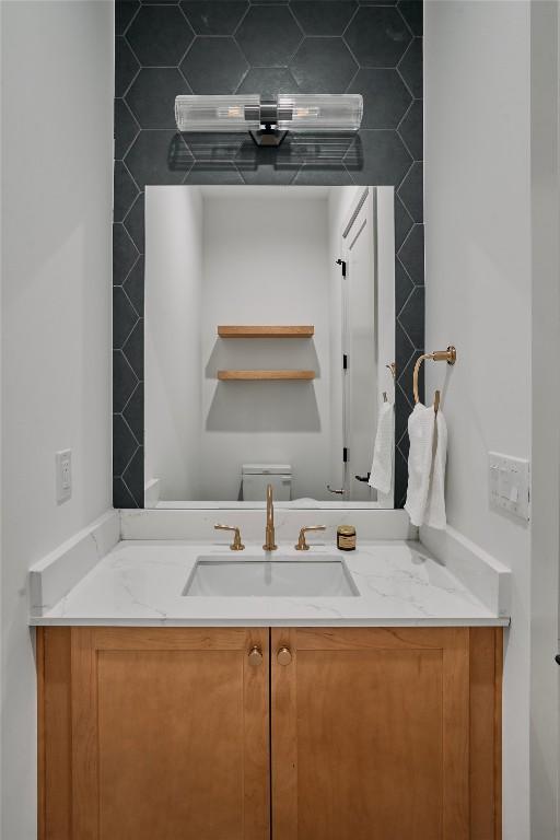 2209 Woodland Ave Unit 501, Austin, TX 78741 - half bathroom with toilet and vanity