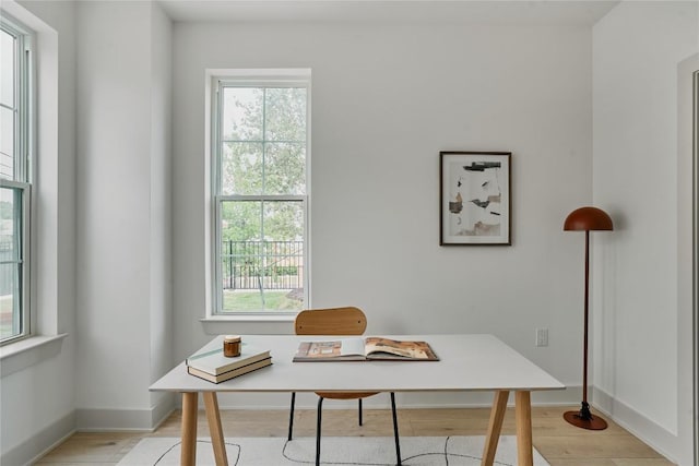2209 Woodland Ave Unit 501, Austin, TX 78741 - home office featuring light wood-style floors and baseboards